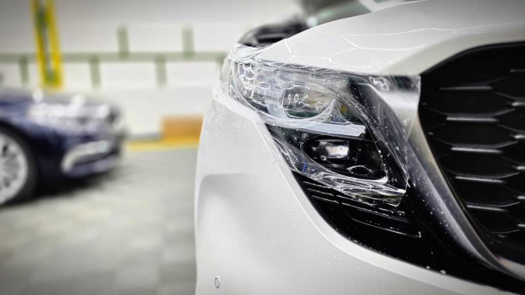 Aplicare folie ppf transparenta pe faruri Mazda noua in Bucuresti